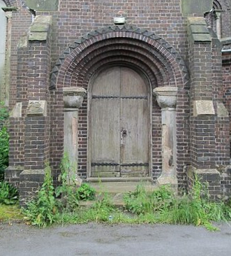 North door to St Johns a disused church at Goldenhill, near Tunstall, Stoke-on-Trent